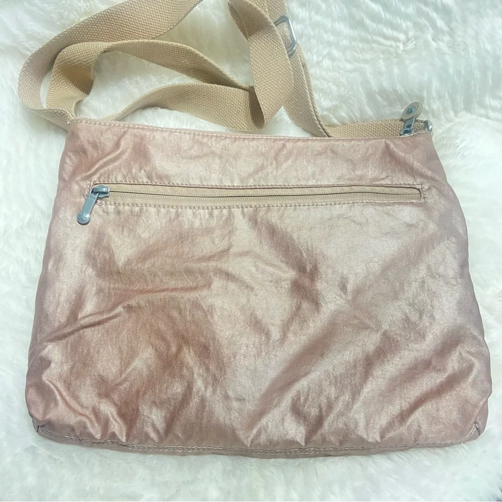 Rose Gold Kipling Pink Crossbody Bag with Signature Style